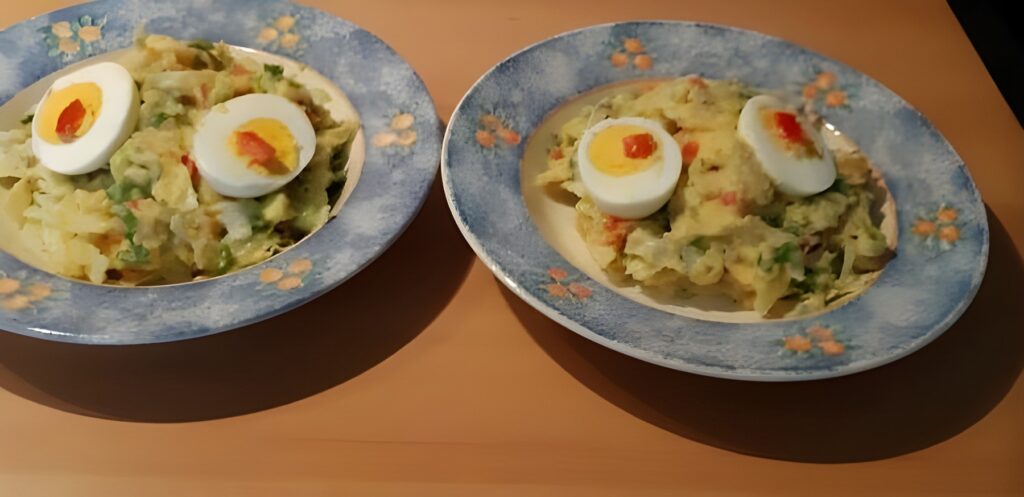 Stamppot ijsbergsla met spek, paprika en kaas