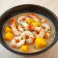 Stoofpotje van scampi’s met mango en gember