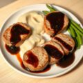 Varkensmedallions met vanille-portsaus