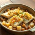 Vis met aardappel en champigons