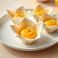 Witte lelies gevuld met mangomousse