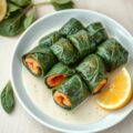 Zalmrolletjes in romige knoflooksaus