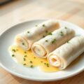 Zeetongrolletjes met prei en botersaus