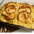 Zuurkoolschotel met spekjes, appel , mosterd en een toplaag van rösti.