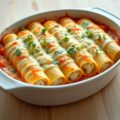 Cannelloni met courgette, mozzarella, ricotta en kruiden