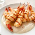 Gamba’s met luchtige pernodsaus