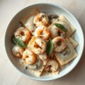 Garnalen-paddestoelenravioli in truffel-roomsaus