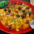 Gele tomatensalade met Kalamata olijven en persillade