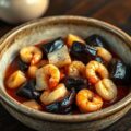 Gestoofde antroewa met bakkeljauw en garnalen