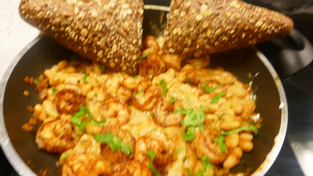 Grote garnalen met cannellini bonen