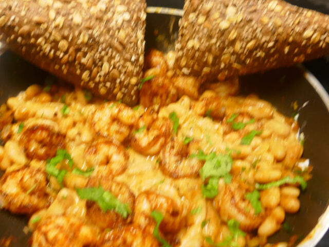 Grote garnalen met cannellini bonen