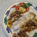 Kabeljauw met champignons en paprika.
