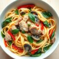Kalfsvlees met pasta en spinazie