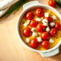 Kerstomaten met kaas uit de oven