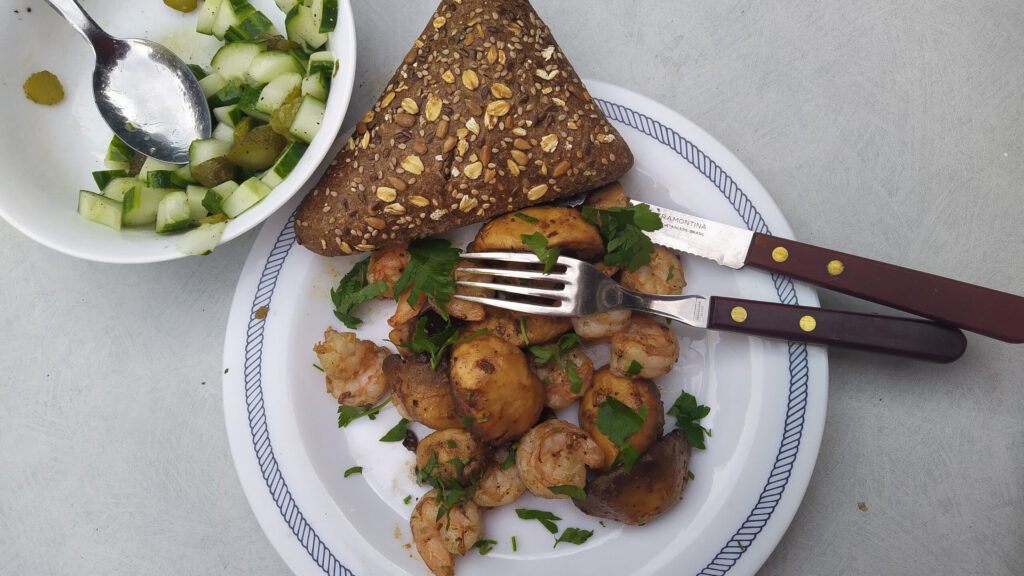 Knoflook garnalen met champignons