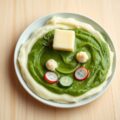 Lach met spinaziepuree!