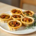 Mini appeltaartjes bij een High Tea