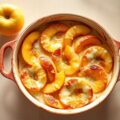 Perzikengratin met verse kaas
