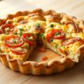 Quiche met tomaten, paprika, bleekselderij en uien