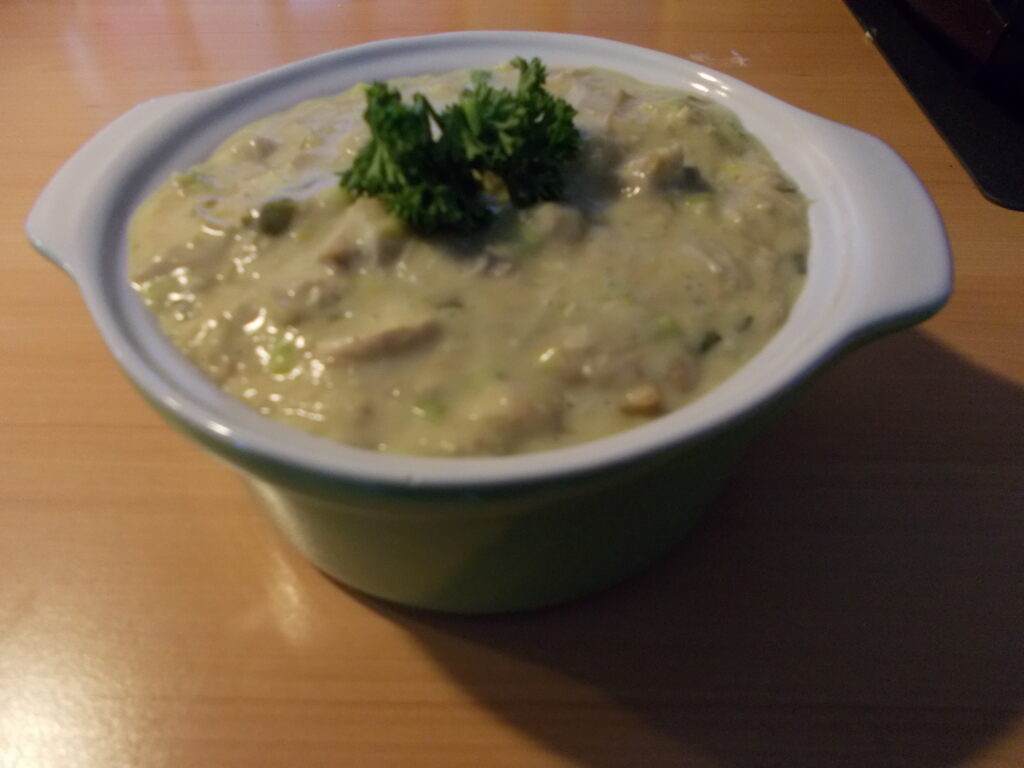 Kippenragout met cognac en champignons