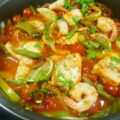 Spaanse stoof met zalm en garnalen