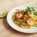 Spaghetti met scampi’s en koriander