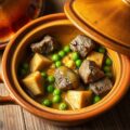 Tajine van kalfsvlees met artisjokken en erwten