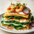 Warme “clubsandwlch” van lasagne met gebakken scam
