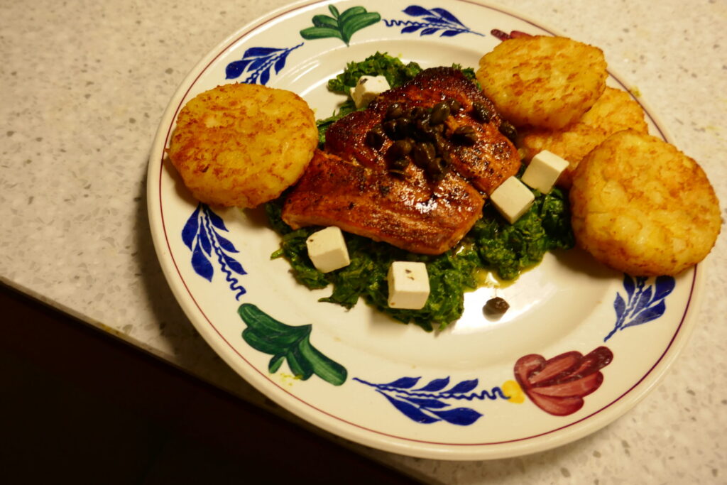 Zalm met kruidige spinazie uit de oven