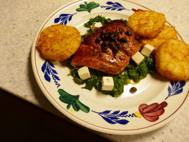 Zalm met kruidige spinazie uit de oven