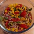 Zonnige salade van flageolets met paprika en tomaatjes