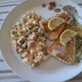 Spaans Russische salade “Ensalada Rusa” met gebakken kabeljauw