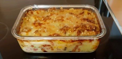 Bloemkoolschotel met romige champignonsaus en Parmezaanse kaas