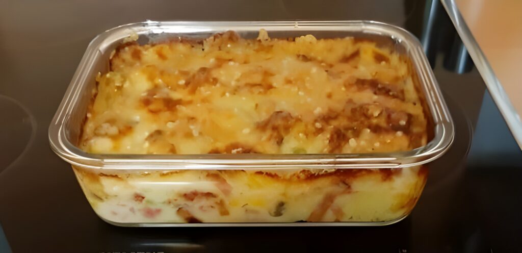 Bloemkoolschotel met romige champignonsaus en Parmezaanse kaas