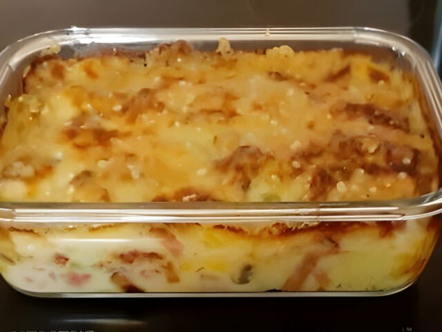 Bloemkoolschotel met romige champignonsaus en Parmezaanse kaas