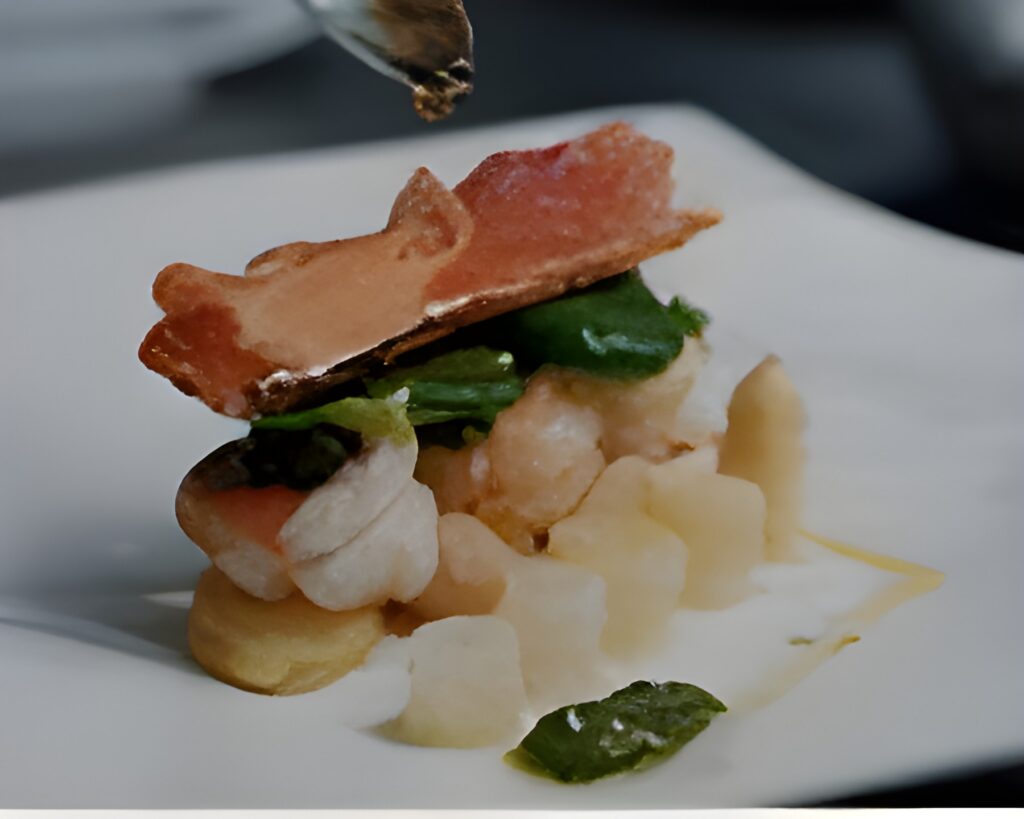 Scampi met asperges en Serranoham