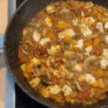 Afrikaans gekruide kipfilet met linzen, champignons, paprika, courgette en tomaat