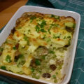 Ovenschotel met doperwten, romige champignons en brie
