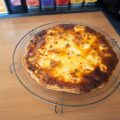 Quiche met kalkoenfilet, geitenkaas, courgette, paprika en tomaat