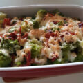 Romanesco met doperwten, rauwe ham, ei en kaas