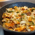 Witlof met zalmfilet uit de wok