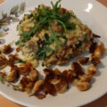 Rucola-stamppot met gebakken champignons en gedroogde tomaatjes